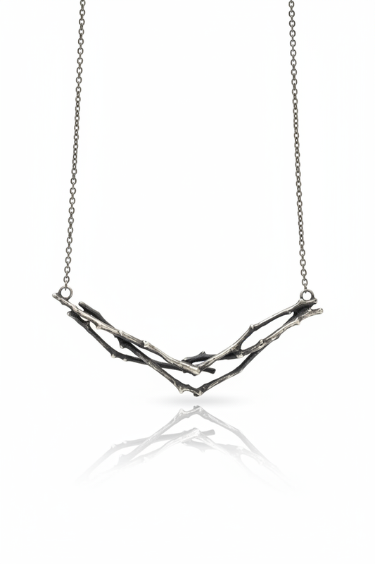 Collar Ramas Plata fondo blanco profesional